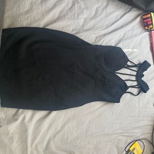 A black dress it’s brand new tag still attached